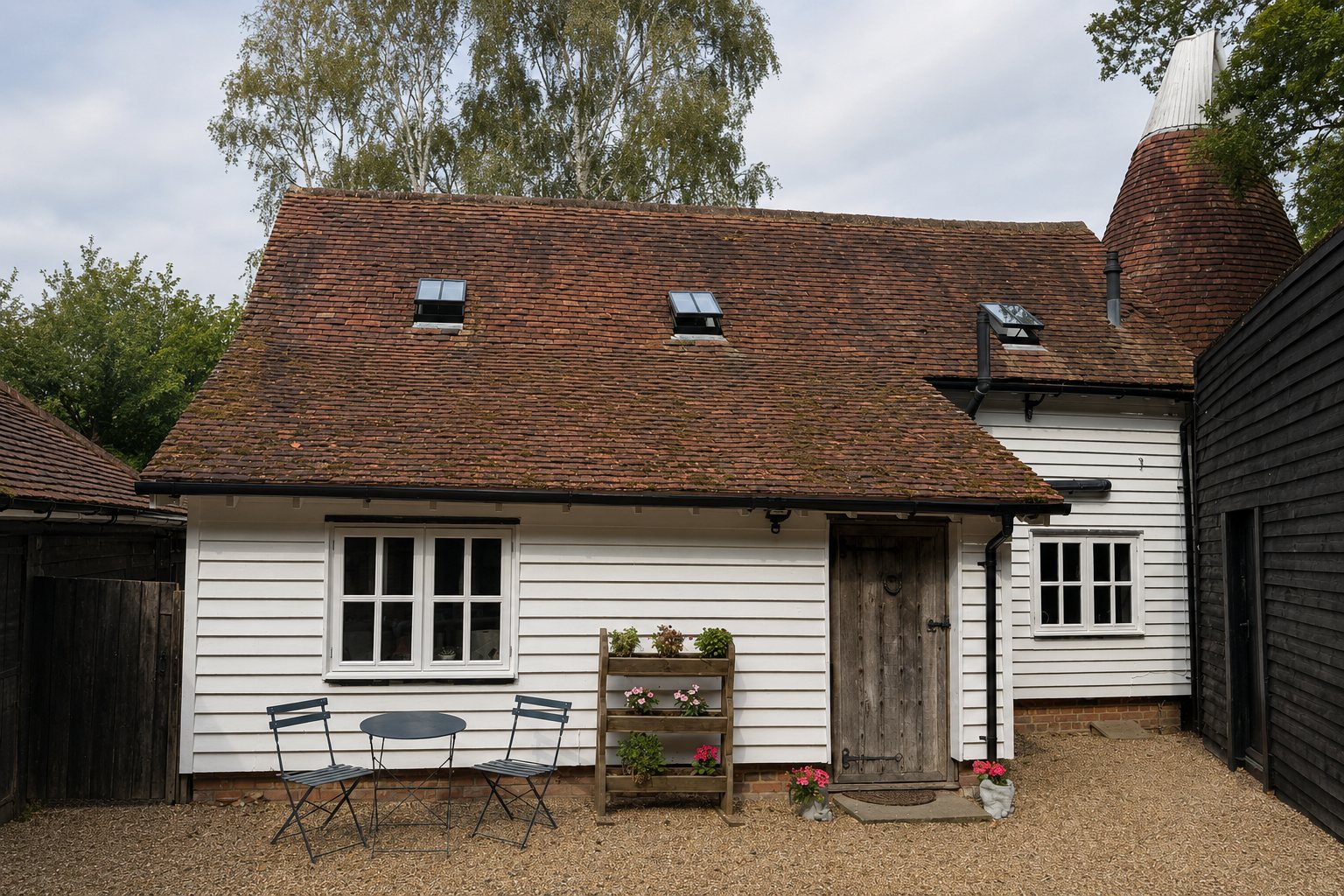 The front of The Oast at Martins Farm, seen across the courtyard.